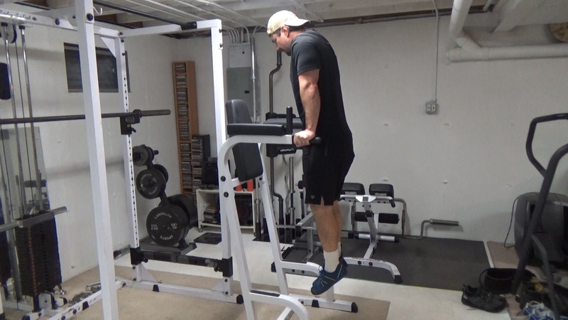 Tighten Your Lower Abs With Vacuum Leg Raises With Feet Hooked