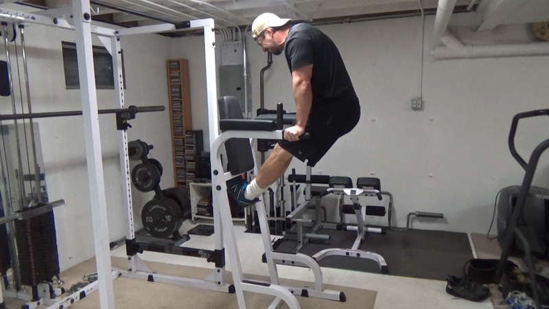 Tighten Your Lower Abs With Vacuum Leg Raises With Feet Hooked Pull Back