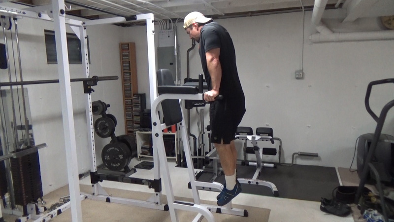 Tighten Your Lower Abs With Vacuum Leg Raises With Feet Hooked