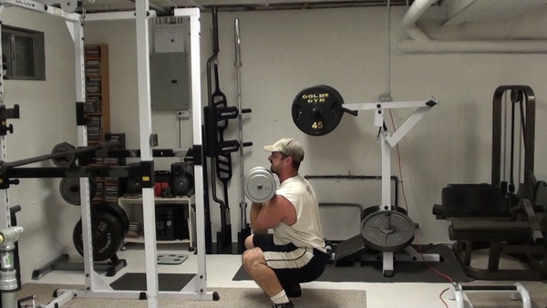 Build Serious Core Strength With One-Dumbbell Curl Squats Bottom 2