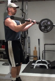 Arms-Forward Barbell Curls - Middle