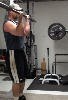 Arms-Forward Barbell Curls Top
