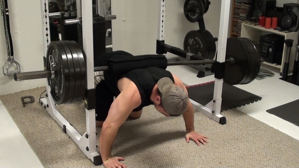 Barbell-Weighted Push-Up Lockouts Top