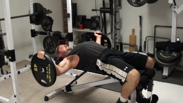 Barbell Plate Flyes Bottom Stretch
