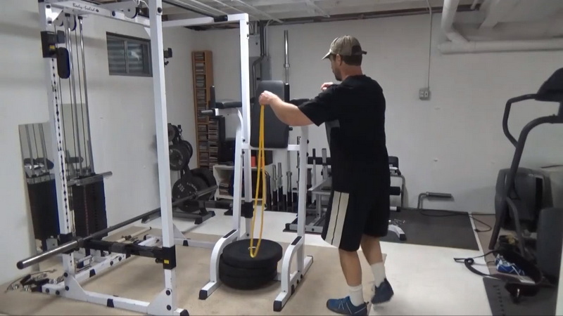 Reverse Hyperextensions on the Ab Chair for Posterior Chain Work and Lower Back Traction Setup 1