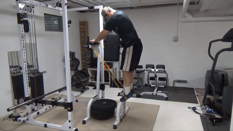 Reverse Hyperextensions on the Ab Chair for Posterior Chain Work and Lower Back Traction setup 4