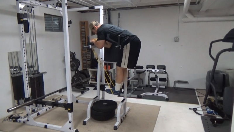 Reverse Hyperextensions on the Ab Chair for Posterior Chain Work and Lower Back Traction Start
