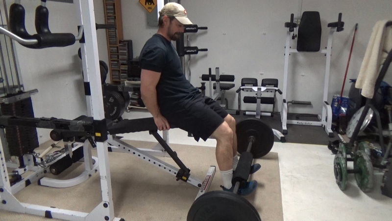 Barbell Leg Extensions for Quad Isolation in a Home Gym Setup