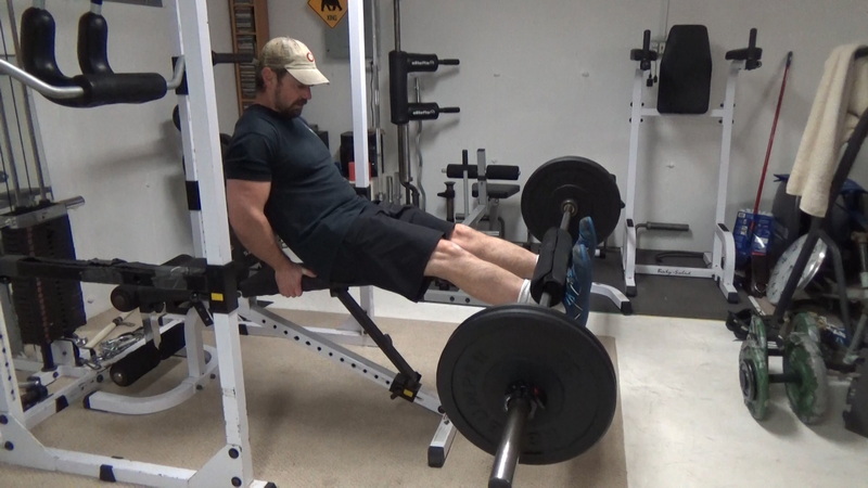 Barbell Leg Extensions for Quad Isolation in a Home Gym Top