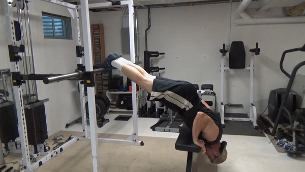 Elevated Pike Handstand Push-Ups for Bodyweight Shoulder Training Bottom