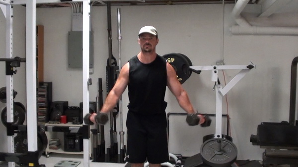 A Simple Lateral Raise Trick For Building Wider Shoulders