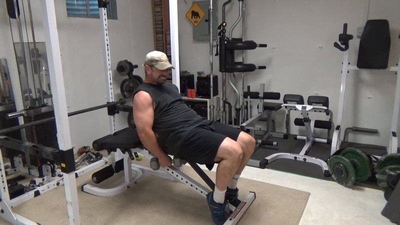 Underbench Lean-Back Lateral Raises bottom stretch
