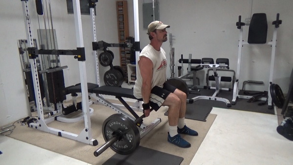 Seated Barbell Shrugs For Traps and Neck Start