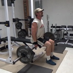 Seated Barbell Shrugs