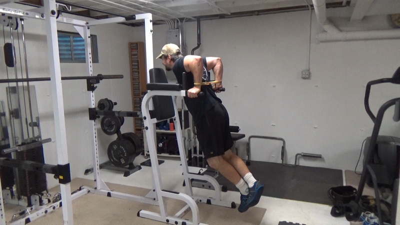 Behind-the-Back Band Dips For Building Tricep Mass bottom