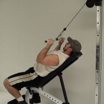 Get a Monster Tricep Contraction With Facing Away Incline Bench Pushdowns