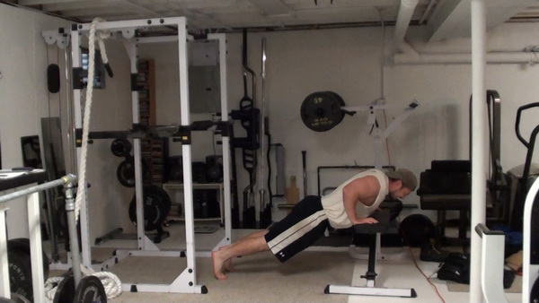 Hands-Elevated Bench Push-Ups Bottom
