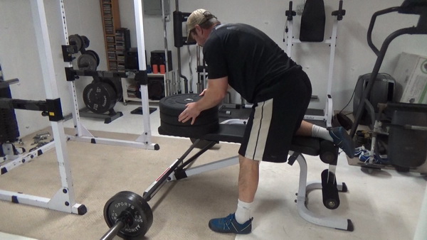 Range-Of-Motion Drop Sets for Chest-Supported Rows add one more plate