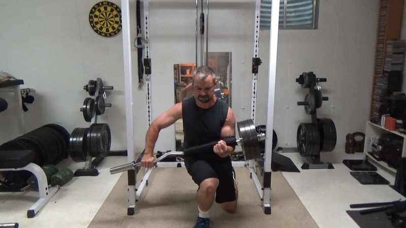 Offset Loaded EZ Bar One-Arm Zercher Reverse Lunges For Deep Core Strength