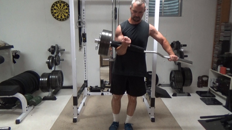 Offset Loaded EZ Bar One-Arm Zercher Reverse Lunges For Deep Core Strength