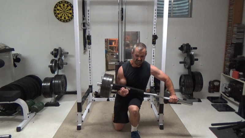 Offset Loaded EZ Bar One-Arm Zercher Reverse Lunges For Deep Core Strength