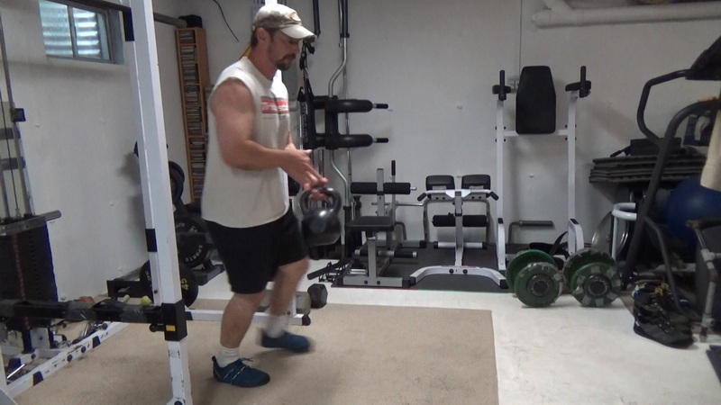 Single Kettlebell Switching Hands Top