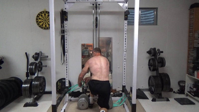 Band-Dumbbell Shrugs for Bigger Middle Traps